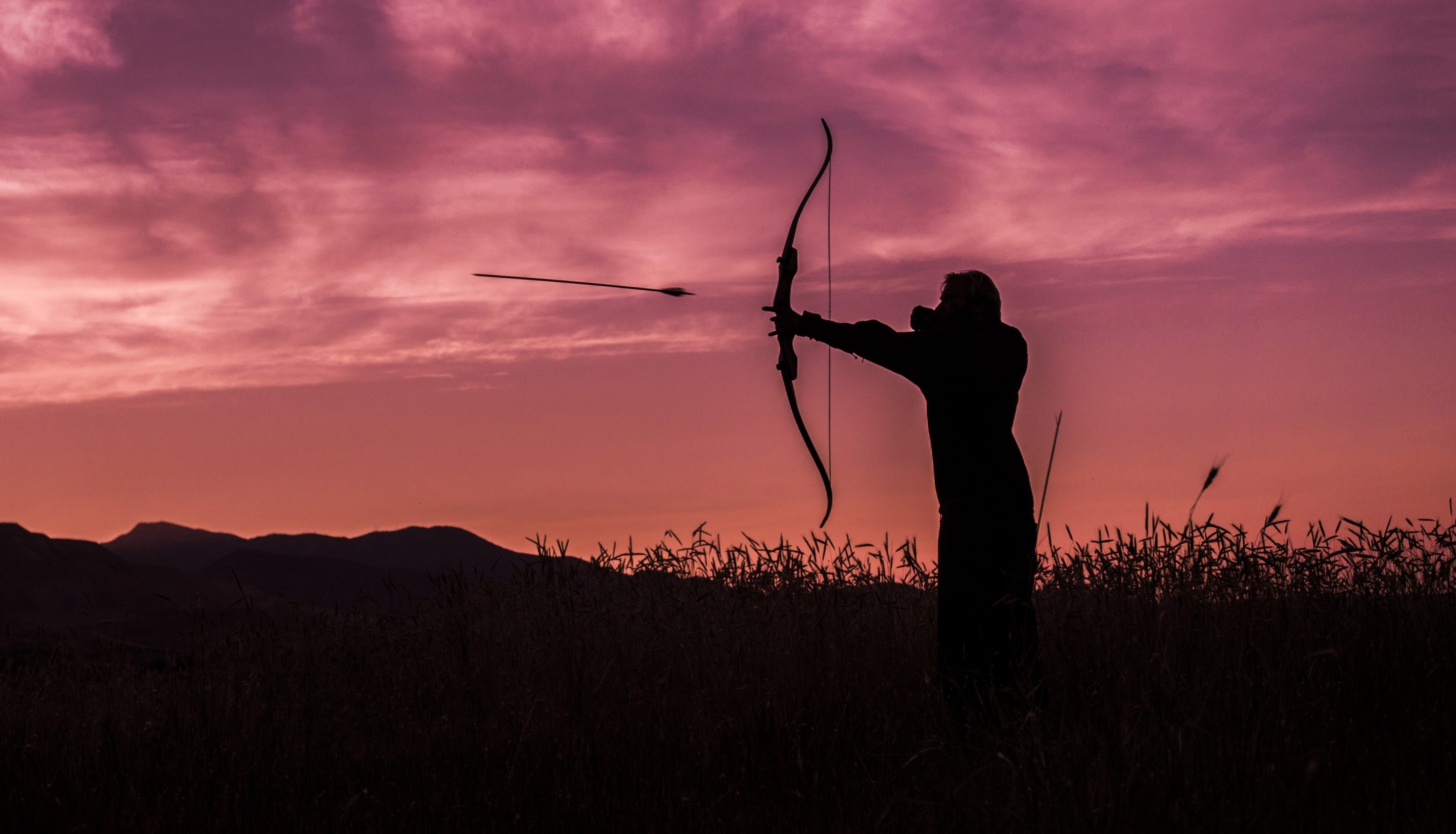 archer firing his arrow